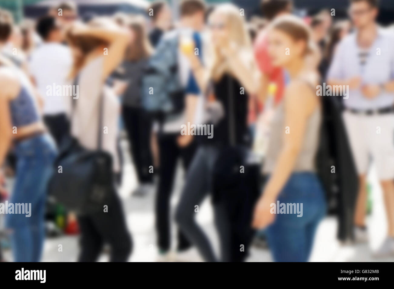 defocused crowd of young people Stock Photo