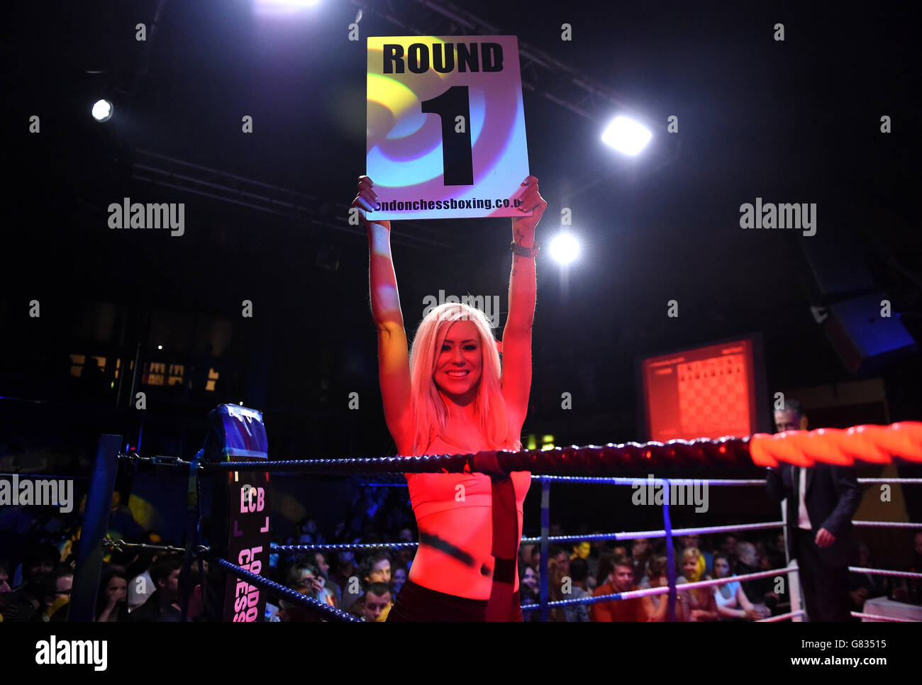 Sport - London Chessboxing Grandmaster Bash! - Scala. A girl carries round  a Round 1 sign ringside at the London Chessboxing Grandmaster Bash at  Scala, London Stock Photo - Alamy