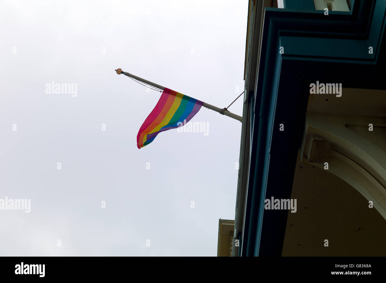 Rainbow flag at half-mast following gun attack on gay club in Orlando, Florida, Brighton, UK Stock Photo