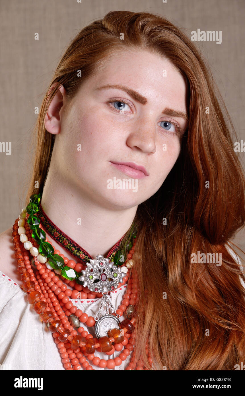Ukrainian girl with the traditional jewelry Stock Photo