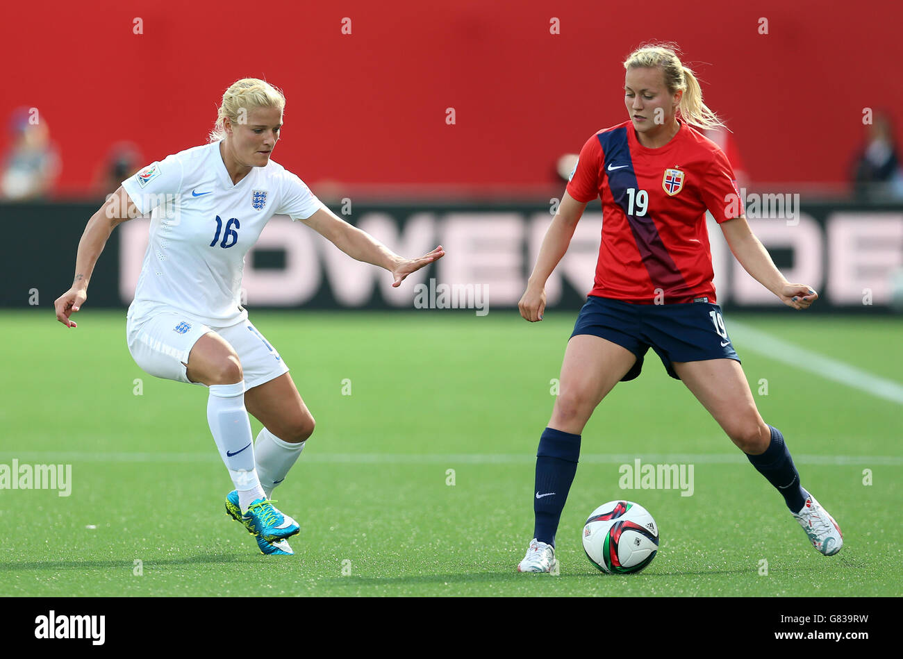 England's Katie Chapman and Norway's Kristine Minde battle for the ball during the FIFA Women's World Cup Canada 2015 Round of 16 match between Norway and England at the Lansdowne Stadium in Ottawa, Ontario, Canada. Stock Photo