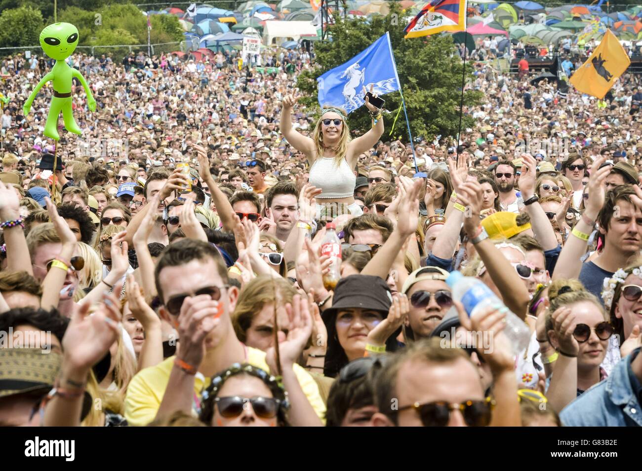 Crowds watch performances on the Pyramid stage, Glastonbury Festival. Stock Photo