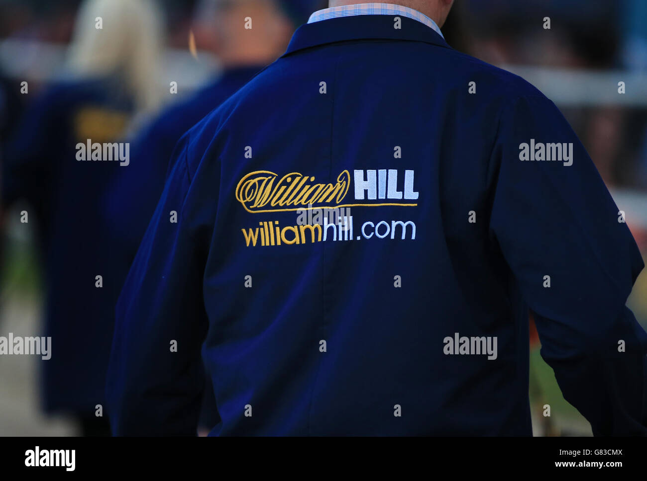 Greyhound Racing - William Hill Derby - Finals - Wimbledon Stadium. Details of handlers coat with WilliamHill.com on the back of the jacket Stock Photo