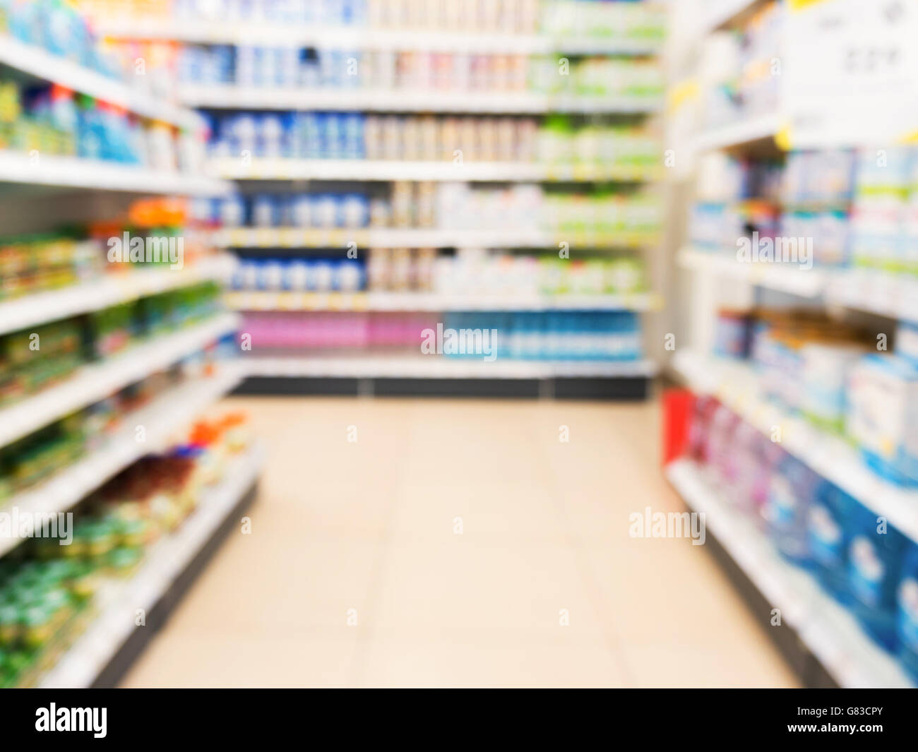 Blurred baby foods jars in store Stock Photo Alamy