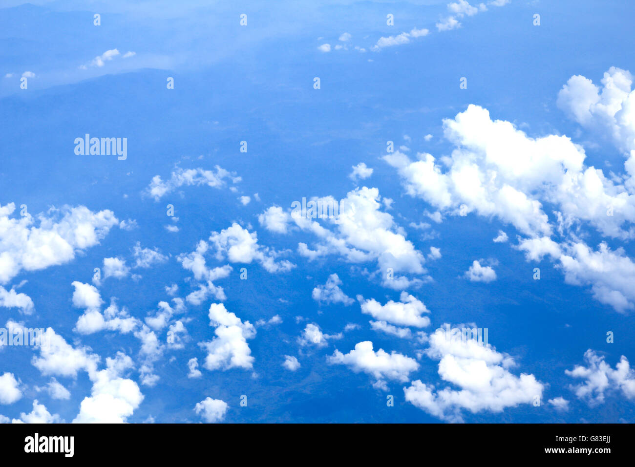 Blue sky and Clouds looking from the Airplane Stock Photo - Alamy
