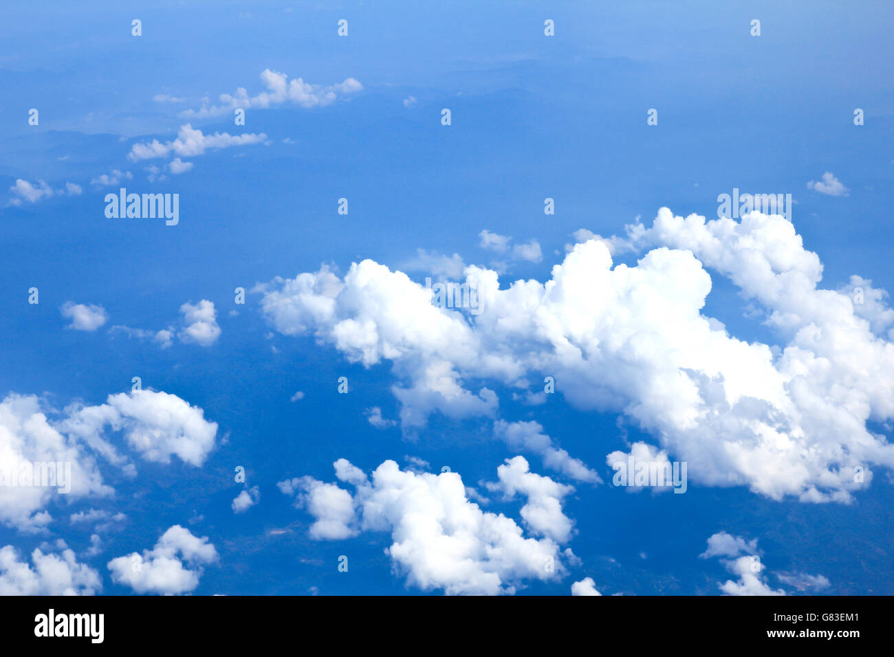 Blue sky and Clouds looking from the Airplane Stock Photo - Alamy