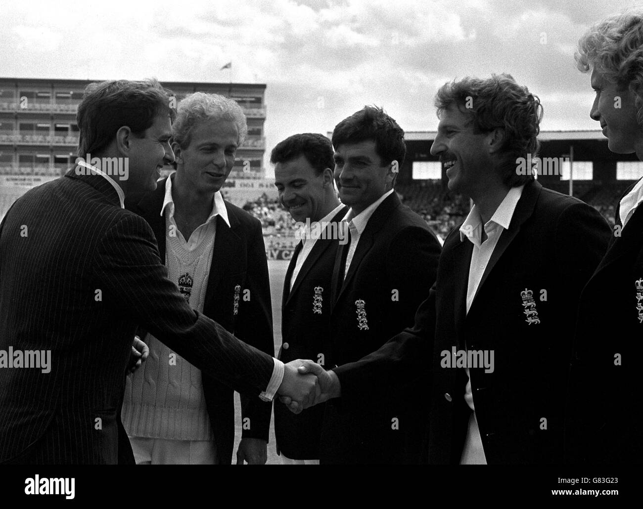 Cricket - Fourth Cornhill Test - England v Australia - Old Trafford. England Cricket captain David Gower (2nd left) introduces all-rounder Ian Botham to the Duke of York (L) during the lunch interval. Stock Photo