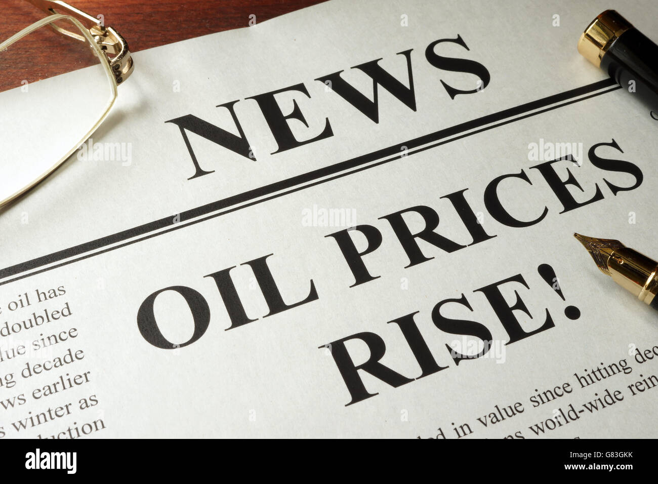 Newspaper with header news and Oil prices rise. Stock Photo