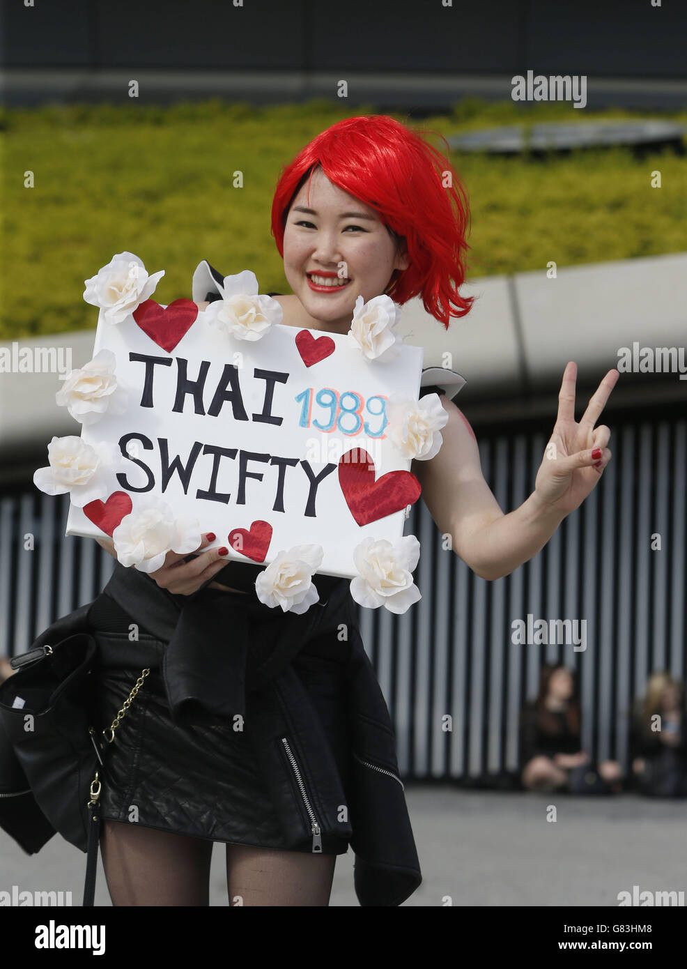 A fan outside the SSE Hydro, Glasgow, ahead of the first date on the Taylor Swift 1989 World Tour. Stock Photo