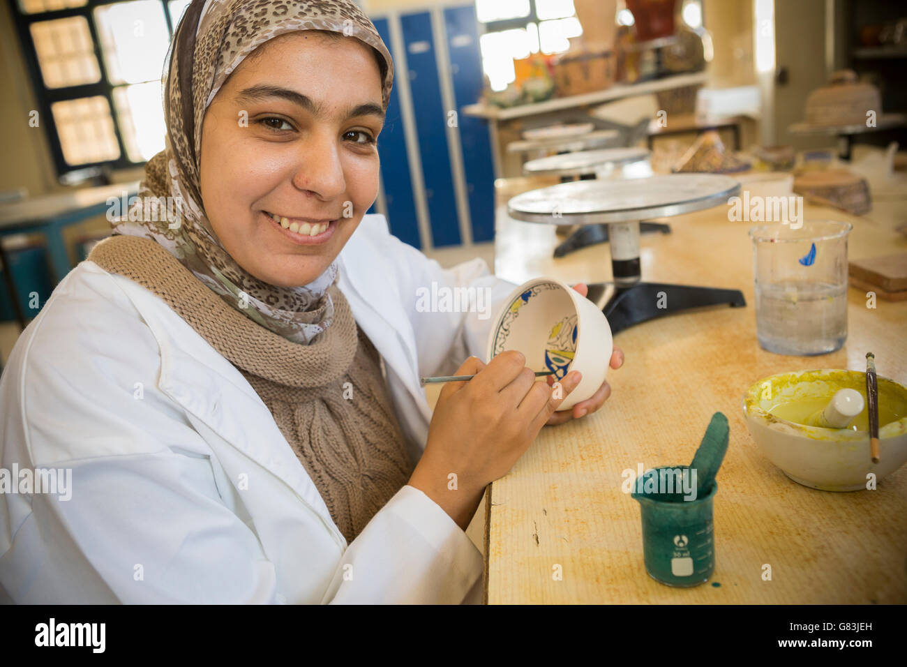 A student works in the pottery workshop at the Institute of Traditional Arts in Fez, Morocco. Stock Photo