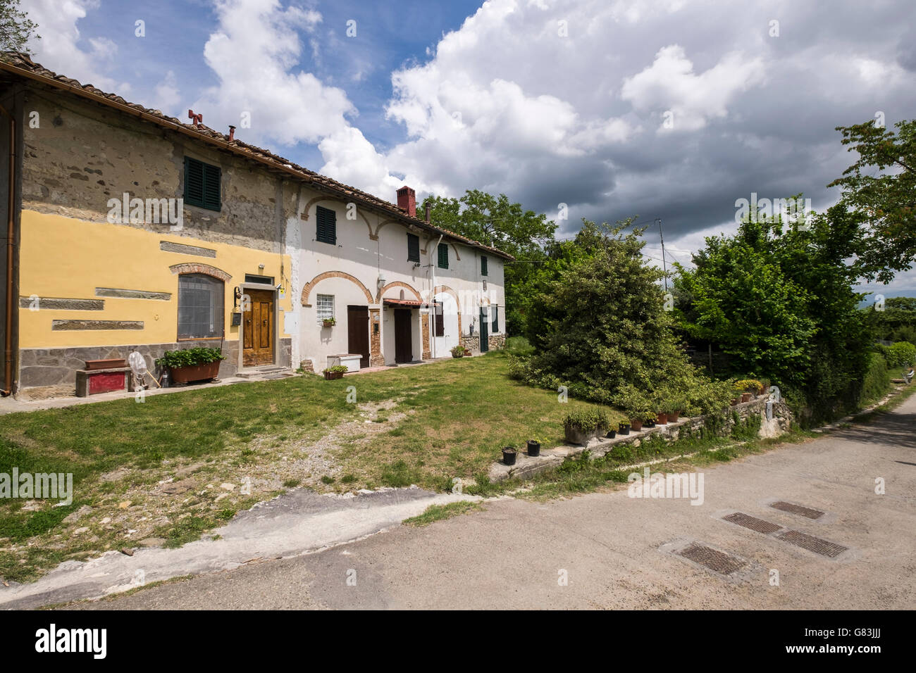 Row of renovated old houses on the Via Lumena near Sant Agata, Tuscany, Italy Stock Photo