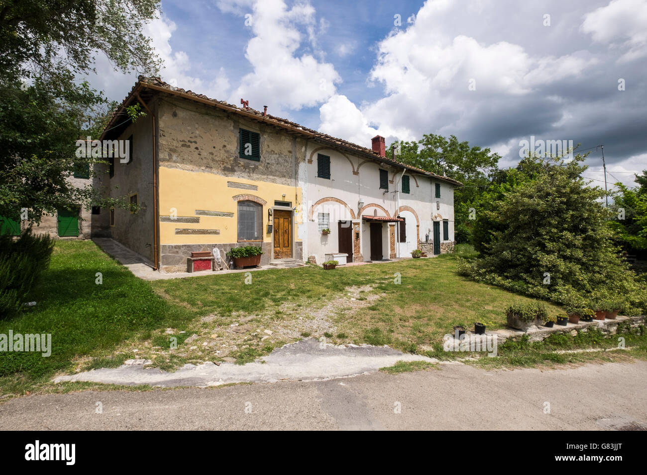 Row of renovated old houses on the Via Lumena near Sant Agata, Tuscany, Italy Stock Photo
