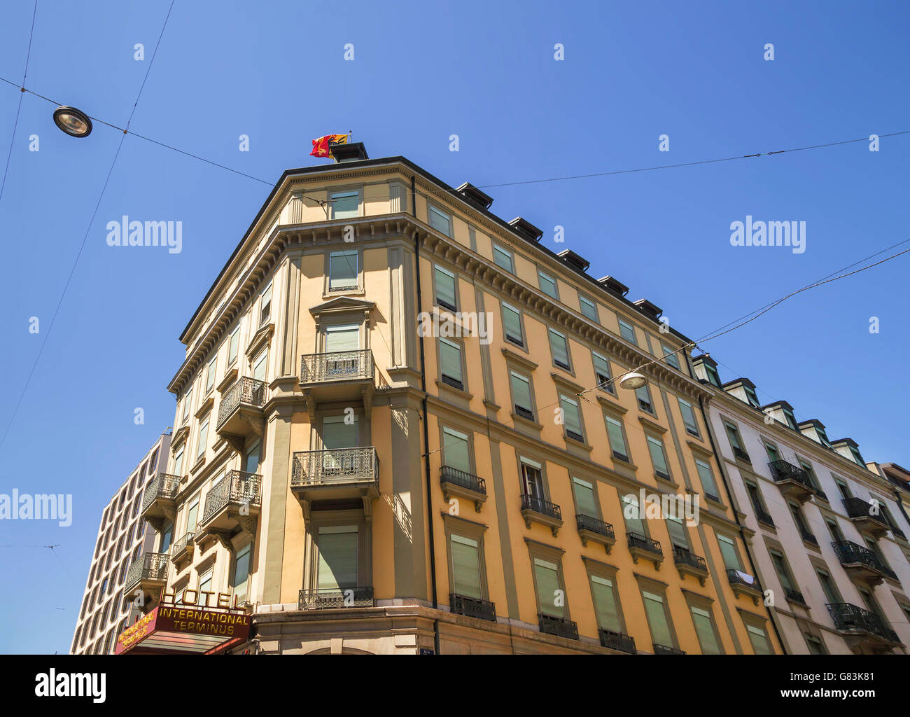 Geneva, one of the most popular Swiss city  - center street view in summertime . Hotel International & Terminus in Rue des Alpes Stock Photo
