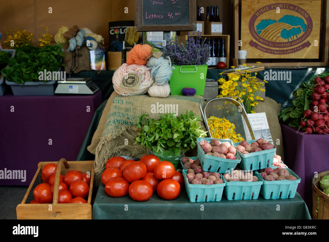 Produce from a biodynamic farm in Stroudsburg, Pa. with hand-dyed wool at the Battery Fair in Lower Manhattan, New York City. Stock Photo