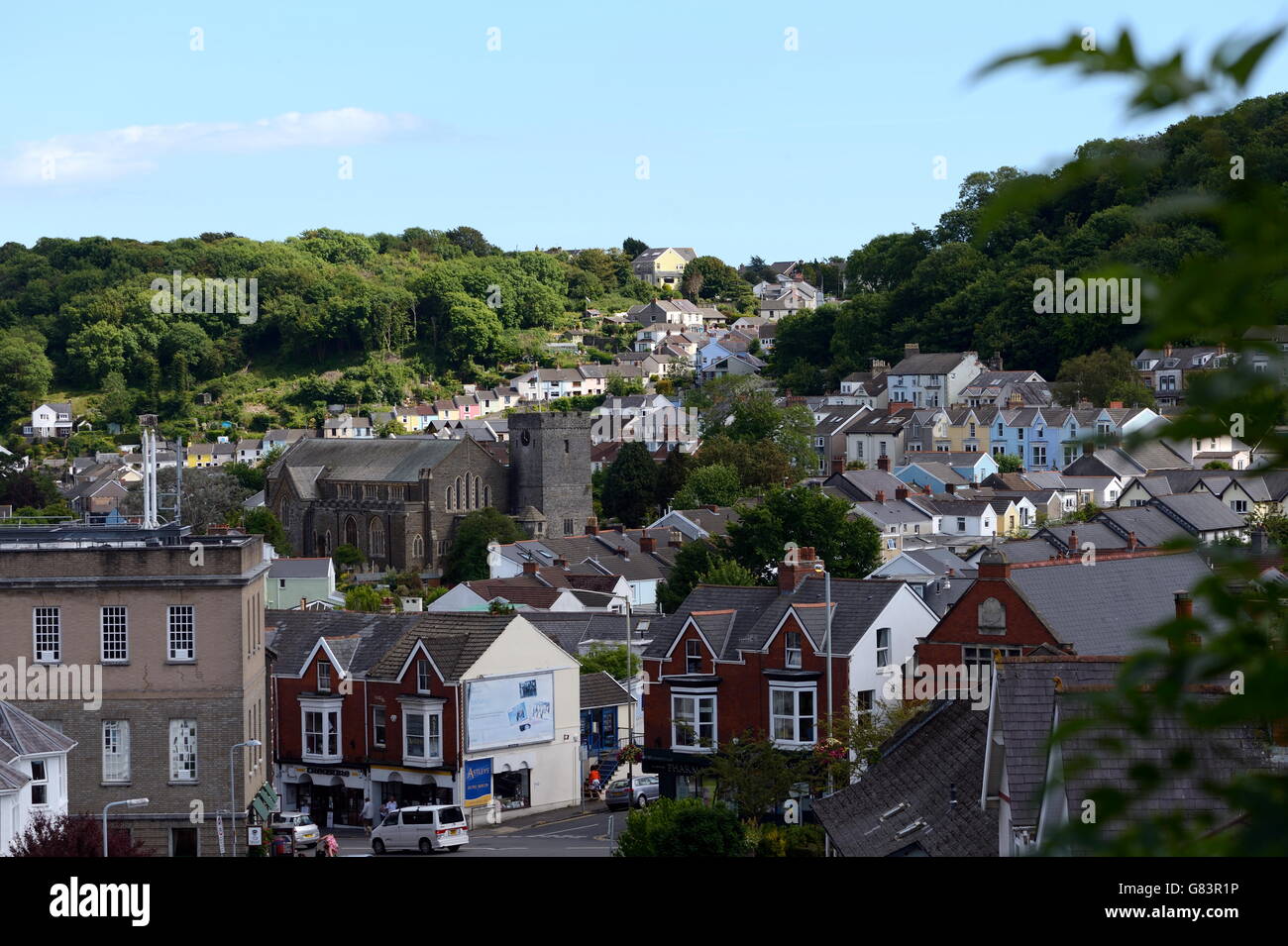 Oystermouth castle seen from Mumbles hill overlooking village, Mumbles, Gower, UK - complete legendary ruin with ramparts, towers and ancient walls. Stock Photo