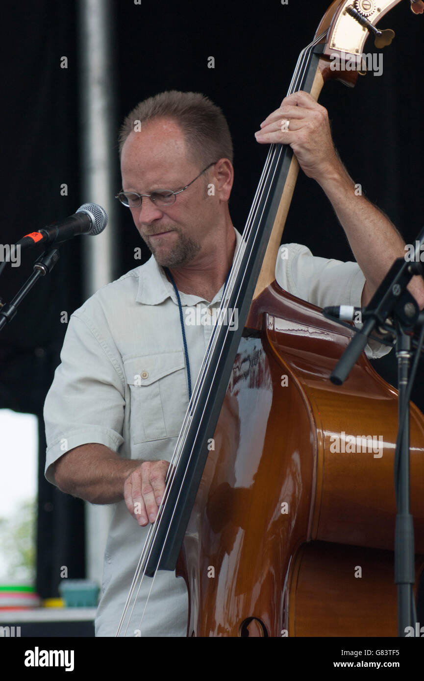 Brad Hiatt playing bass for Mickey Galyean & Cullen's Bridge Bluegrass music at the 2015 American Folk Festival, Bangor, Maine Stock Photo