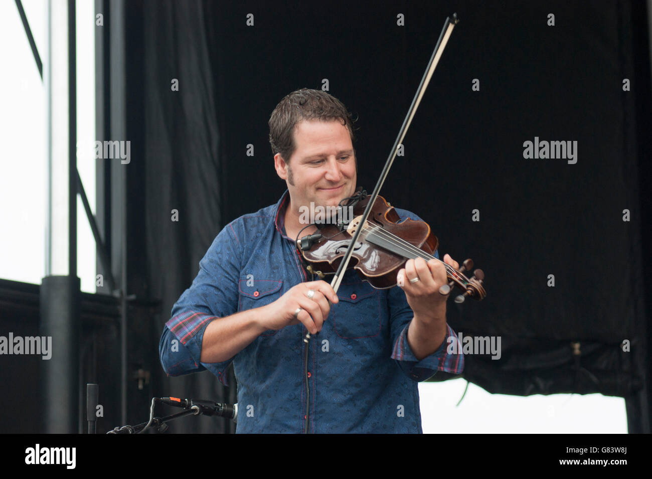 Andre Brunet, Quebecois musician playing the fiddle for De Temps Antan performing at the 2015 American Folk Festival, Bangor, ME Stock Photo