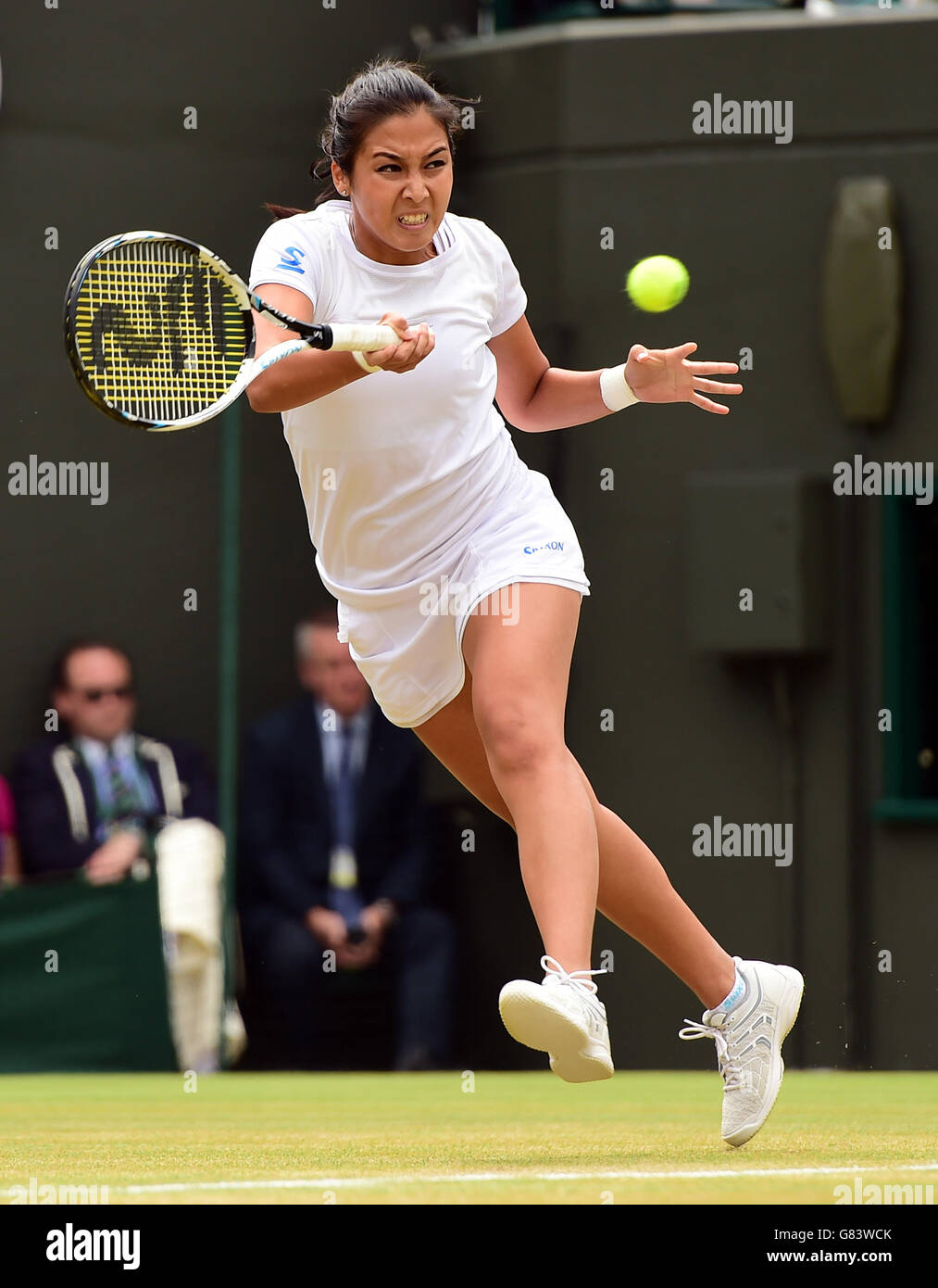 Zarina Diyas in action against Maria Sharapova during day Seven of the Wimbledon Championships at the All England Lawn Tennis and Croquet Club, Wimbledon. Stock Photo