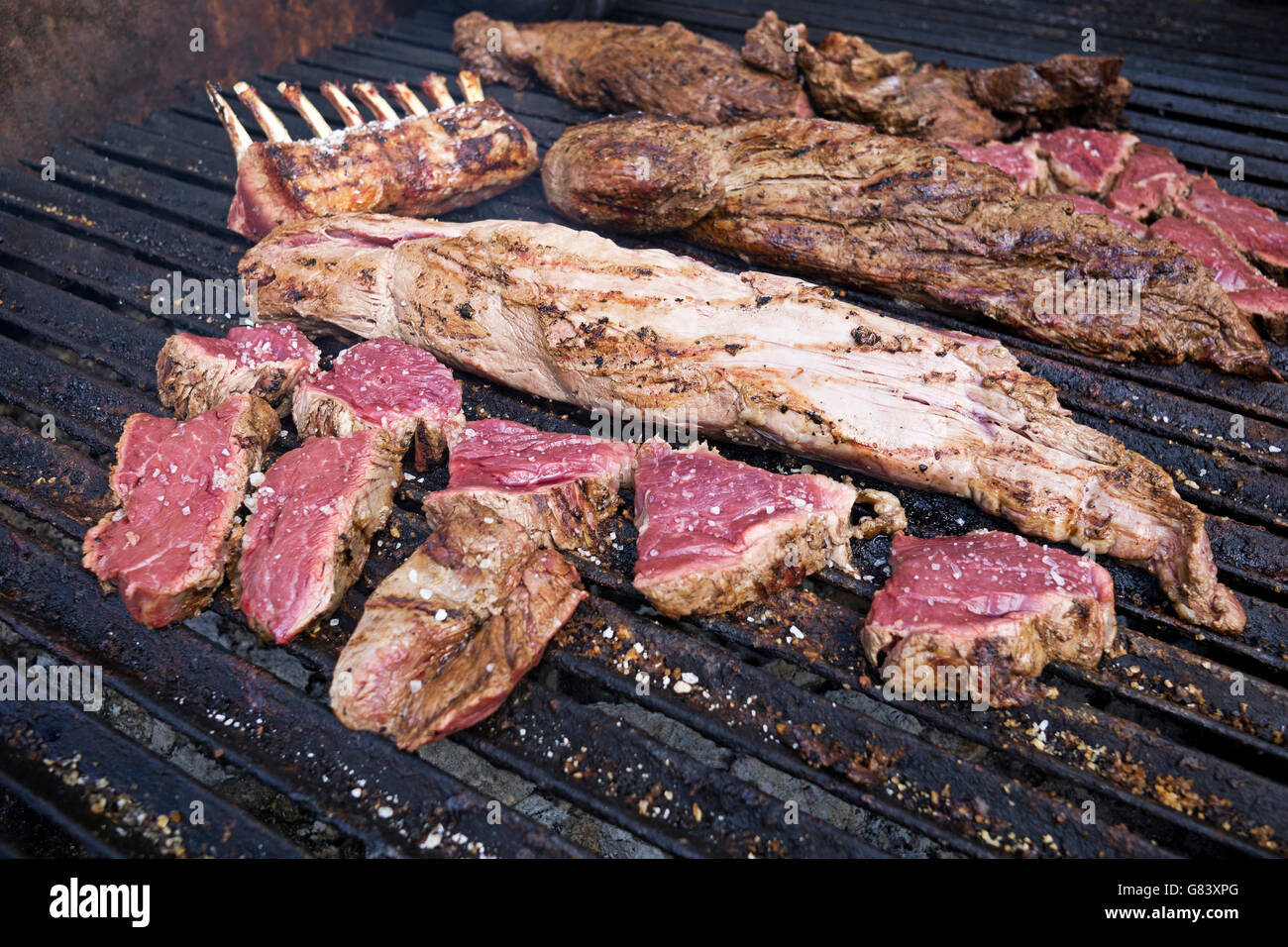 Meat Roted Delicious meat roasted on the grill close up Stock Photo - Alamy