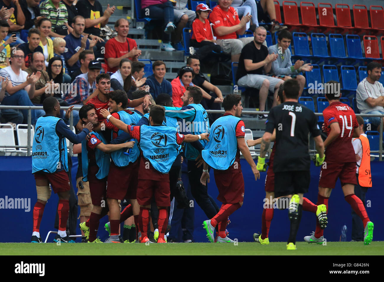 Portugal players celebrate the third goal of the game hires stock