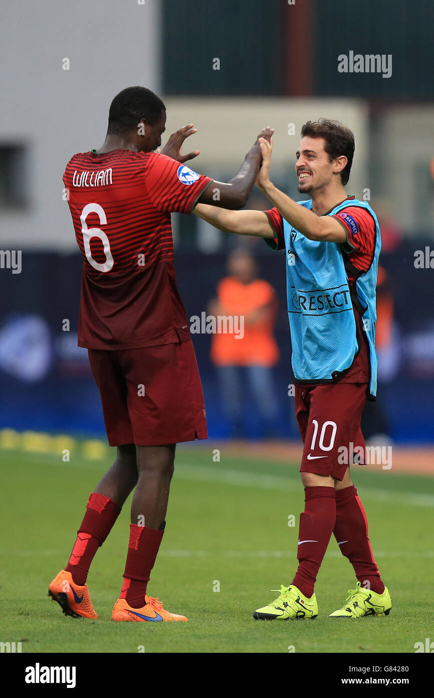 Portugal's William Carvalho (left) and Bernardo Silva (right) celebrate after the final whistle. Stock Photo