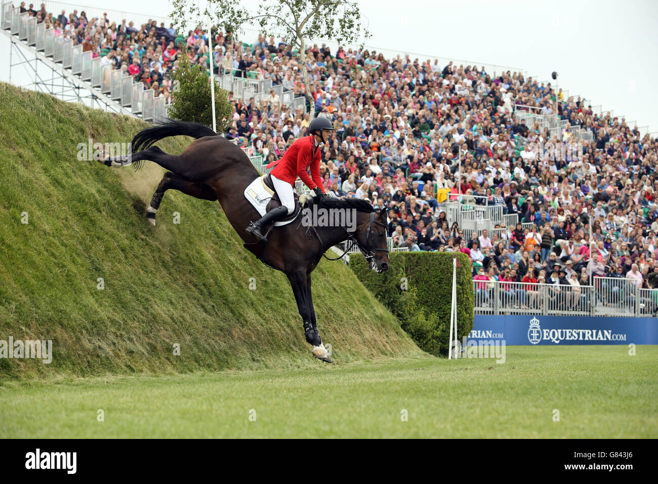 Great Britain's Ellen Whitaker riding Locarno 62 competes in the Equestrian.com Derby during the Hickstead Derby Meeting at the All England Jumping Course, Hickstead. Stock Photo