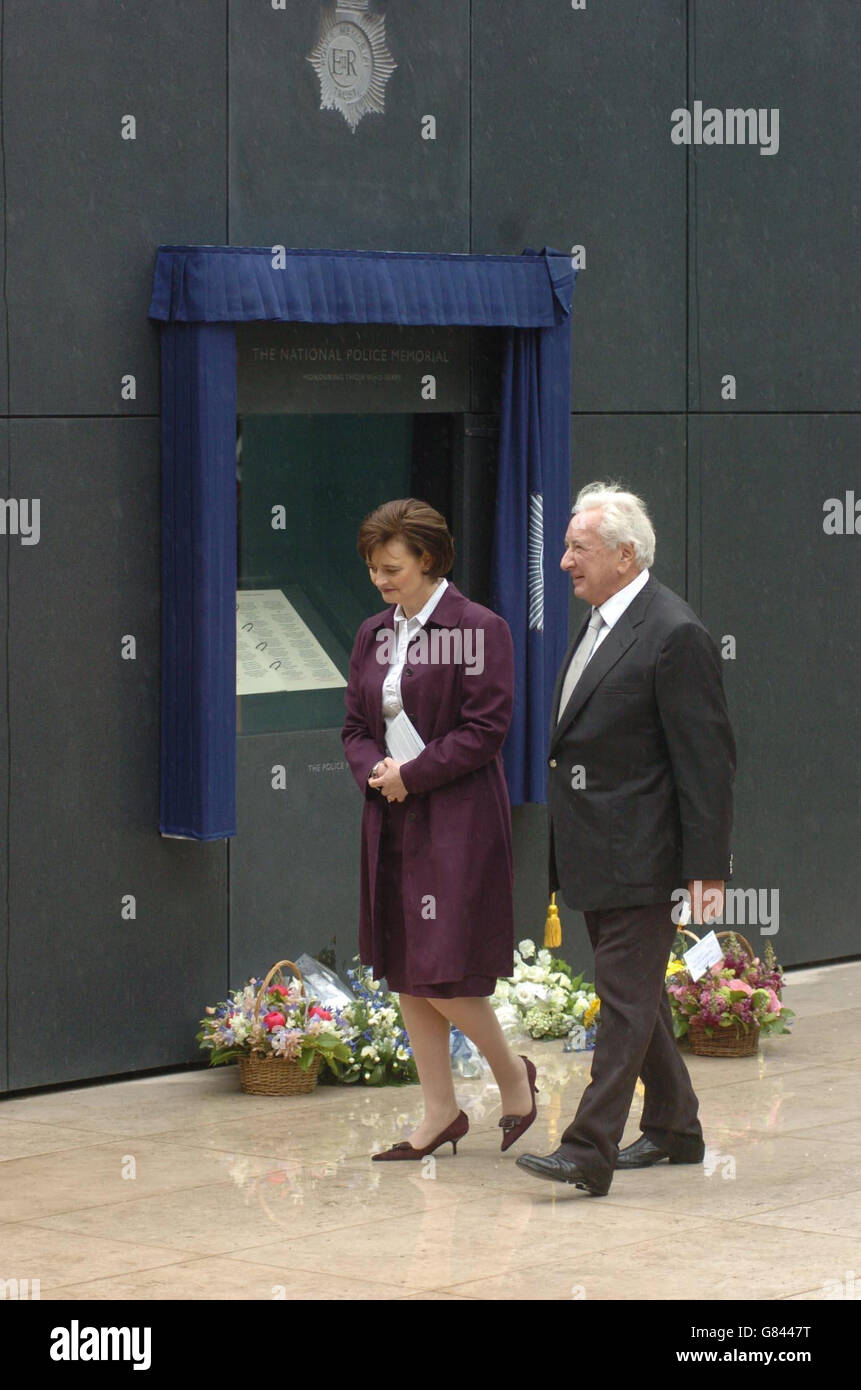 Film director Michael Winner and Cherie Blair, the wife of British Prime Minister Tony Blair walk past the newly unveiled national memorial dedicated to police officers killed in the line of duty. Stock Photo