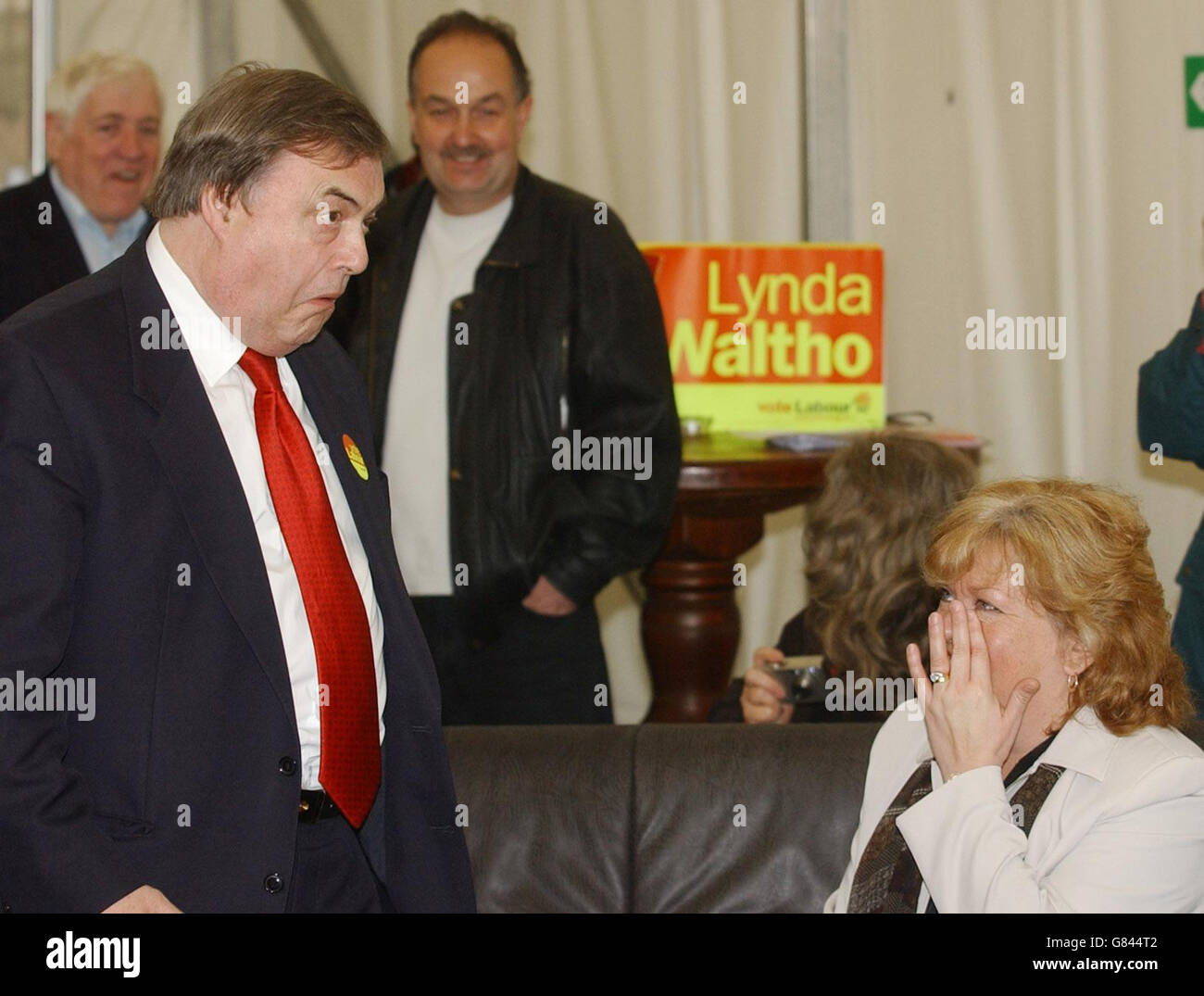 Stourbridge Labour candidate Lynda Waltho (bottom right) reacts during the speech of Labour Deputy Leader John Prescott at Stourbridge, West Midlands. Earlier Greenpeace activists attempted to install a solar panel on the roof of his constituency home in Hull in a bid to highlight the Government's record on energy. Stock Photo