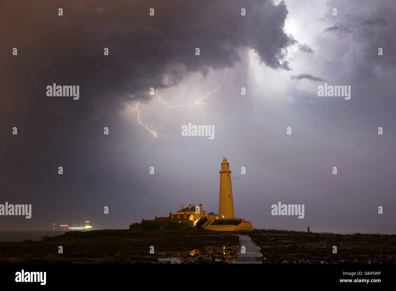 A view of St Mary's Lighthouse near Whitley Bay as a lightning storm
