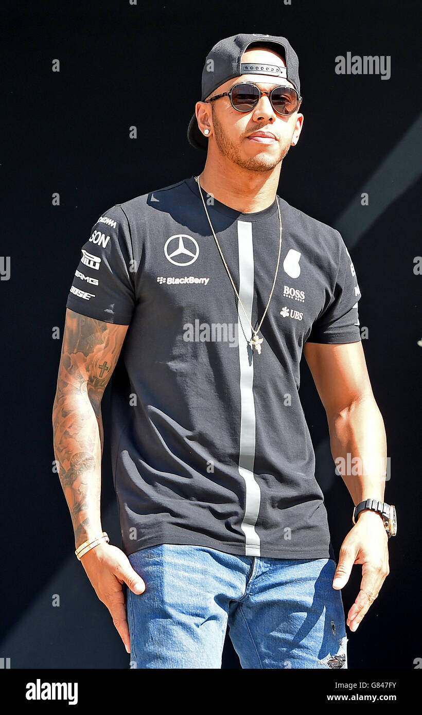 Mercedes driver Lewis Hamilton leaves the team motorhome, during Paddock Day of the 2015 British