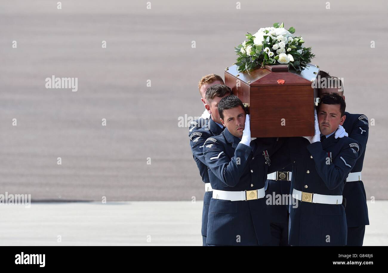 The coffin of Christopher Dyer is carried from the RAF C-17 at RAF Brize Norton in Oxfordshire, one of the final five bodies returned today, out of a total of thirty British nationals killed in last week's Tunisia terrorist attack. Stock Photo