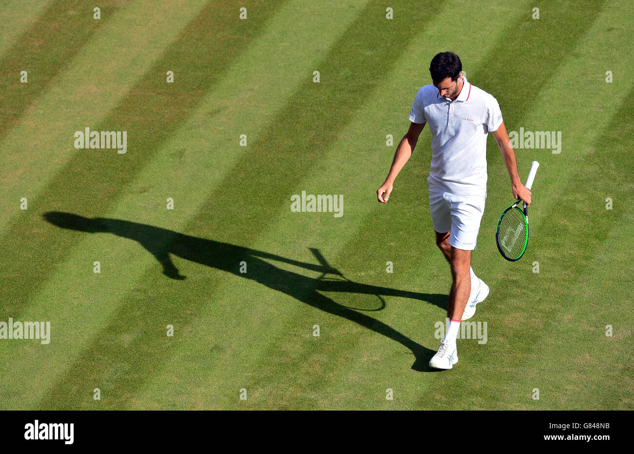 James Ward during his match against Vasek Pospisil during day Six of the Wimbledon Championships at the All England Lawn Tennis and Croquet Club, Wimbledon. Stock Photo