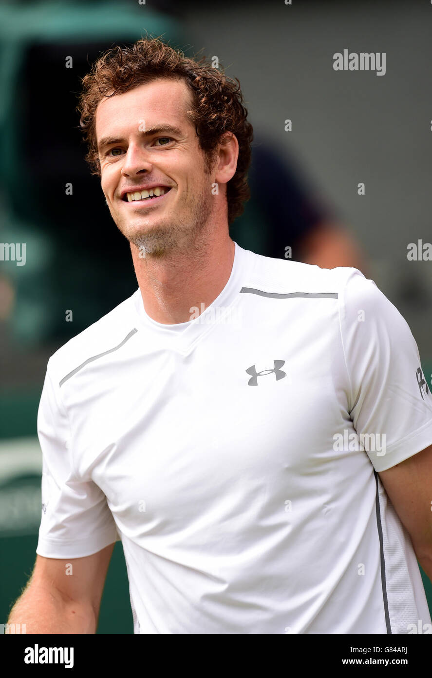 Andy Murray in action Vasek Pospisil during day Nine of the Wimbledon Championships at the All England Lawn Tennis and Croquet Club, Wimbledon. Stock Photo
