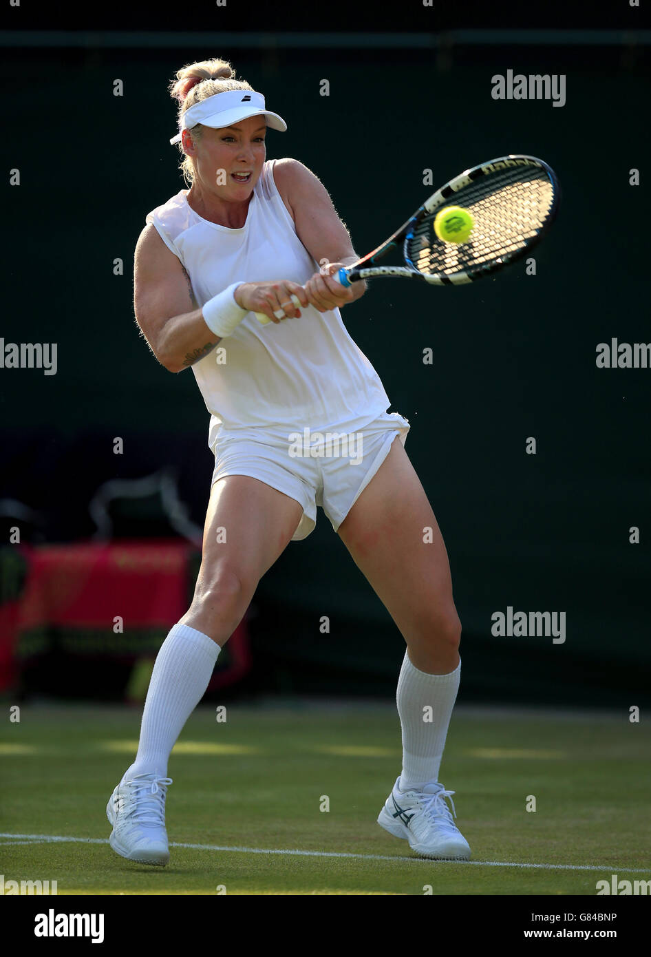 Bethanie Mattek-Sands during her match against Ana Ivanovic on day Three of the Wimbledon Championships at the All England Lawn Tennis and Croquet Club, Wimbledon. Stock Photo