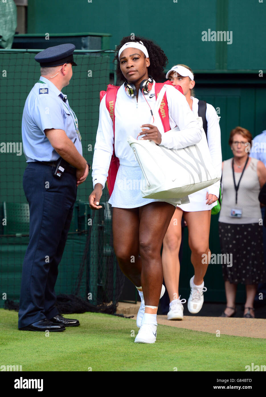 Serena Williams makes her way onto centre court during day Three of the Wimbledon Championships at the All England Lawn Tennis and Croquet Club, Wimbledon. Stock Photo