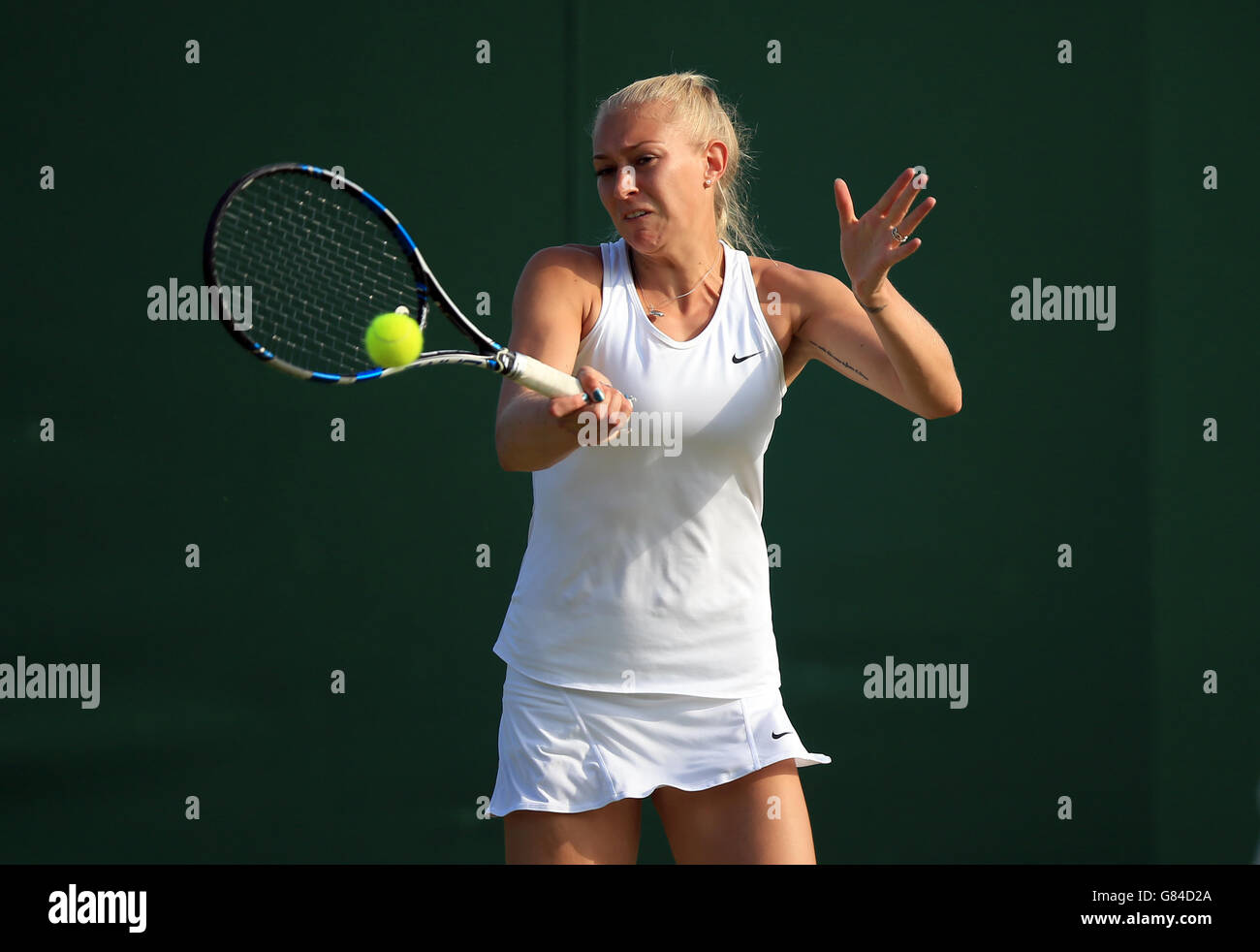 Jocelyn Rae in action in her doubles match with Colin Fleming on day Five  of the Wimbledon Championships at the All England Lawn Tennis and Croquet  Club, Wimbledon Stock Photo - Alamy