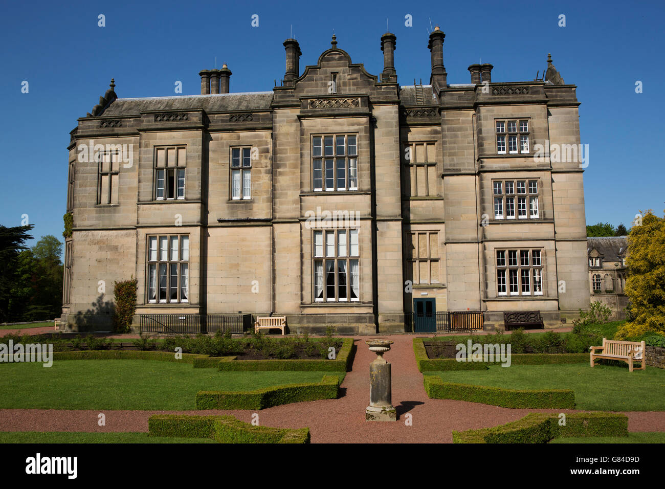 Matfen Hall in Northumberland, England. The Neo-Gothic manor house is a luxury hotel with a restaurant, spa and golf course. Stock Photo