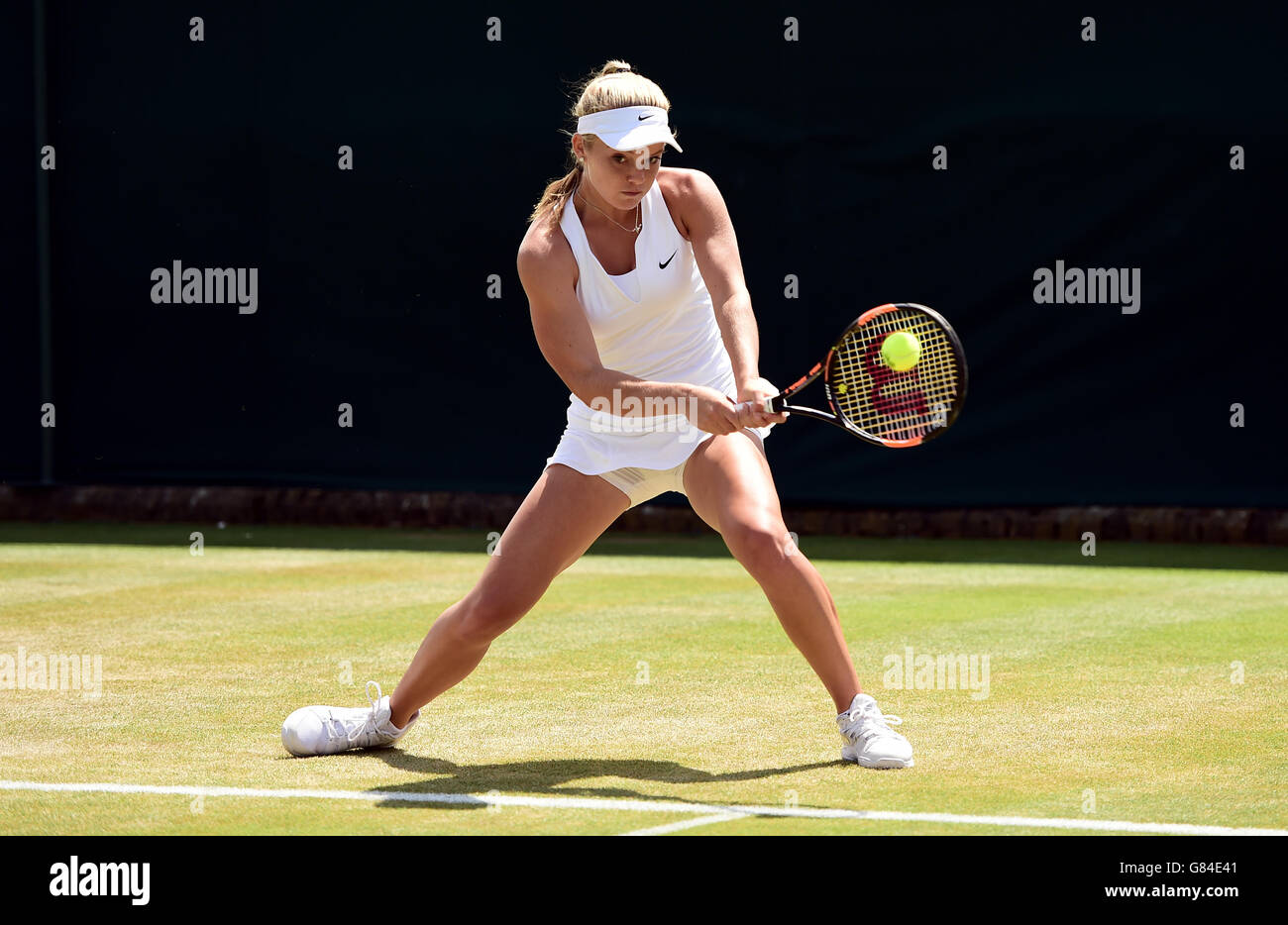 Katie Swan in action during day Eight of the Wimbledon Championships at