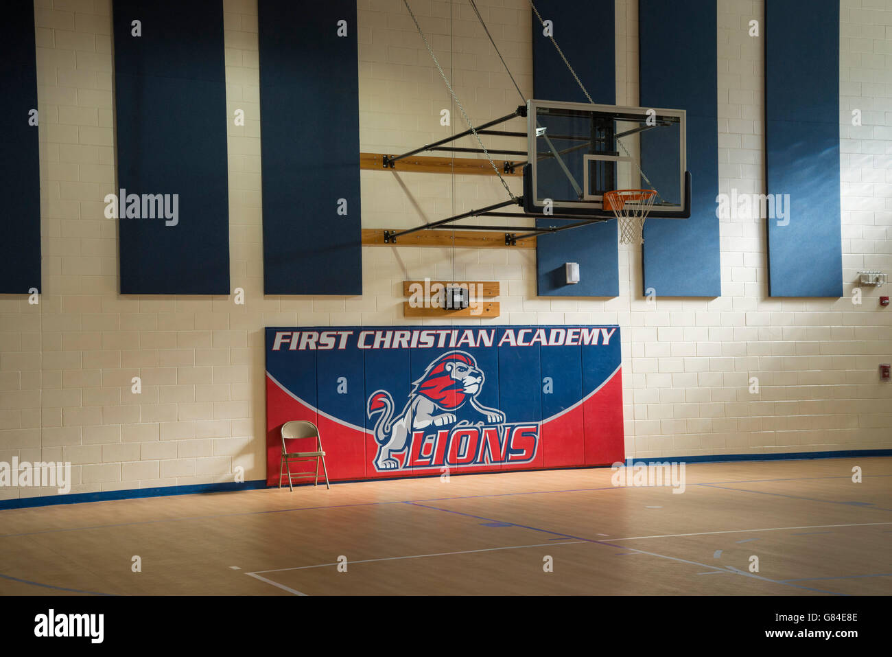 Banner For First Christian Academy Under The Basket Inside The