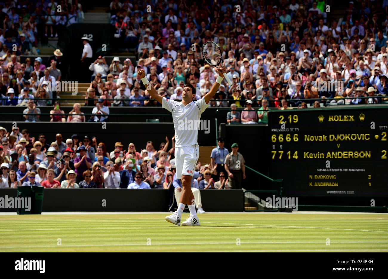 Novak Djokovic celebrates victory over Kevin Anderson during day Eight of the Wimbledon Championships at the All England Lawn Tennis and Croquet Club, Wimbledon. Stock Photo