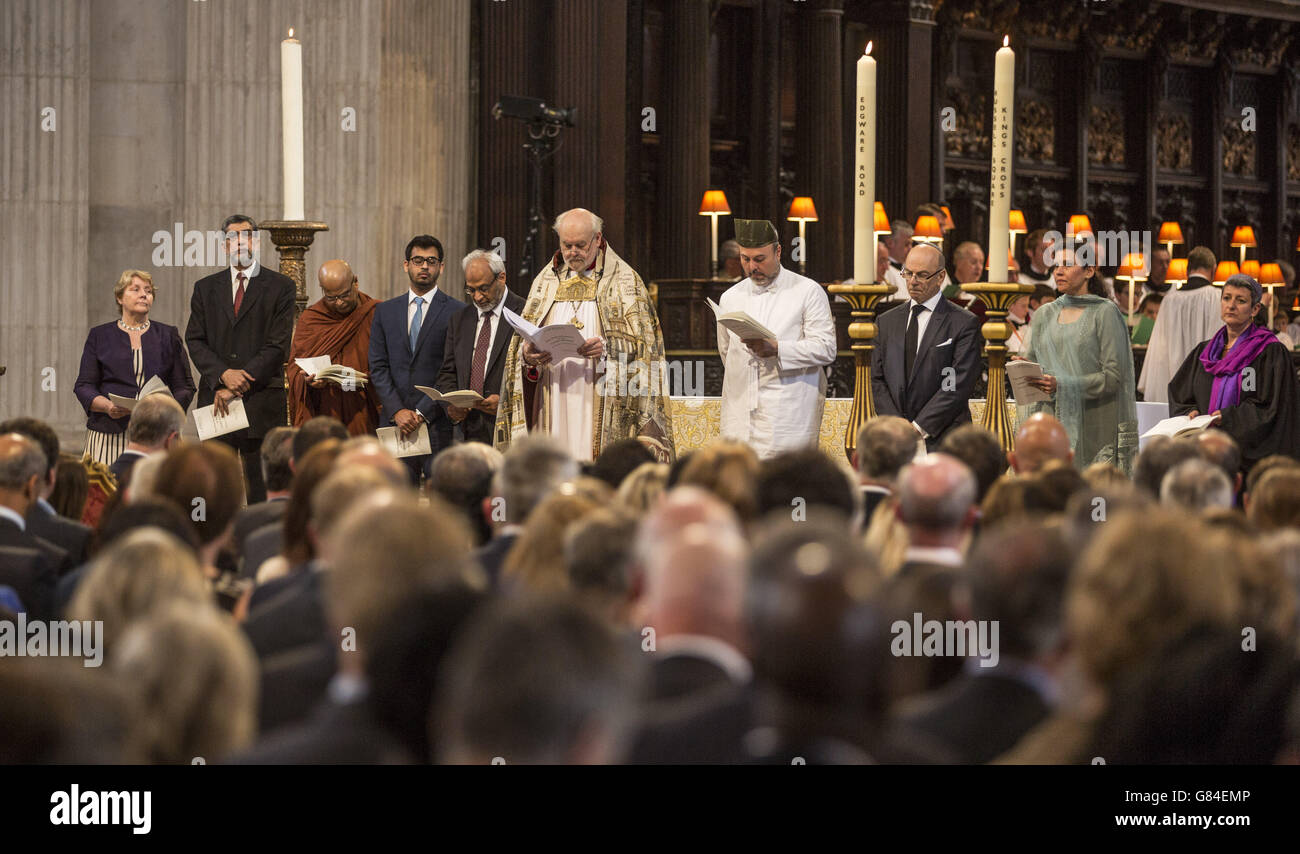 The Bishop of London Richard Chartres (fifth right) stands with representatives of other religions, during a memorial service at St Paul's Cathedral, London, for the victims of the July 7 bombings exactly 10 years after London's transport network came under attack, as Britain remembers the 7/7 attacks amid a welter of warnings about the enduring and changing threat from terrorism a decade on. Stock Photo