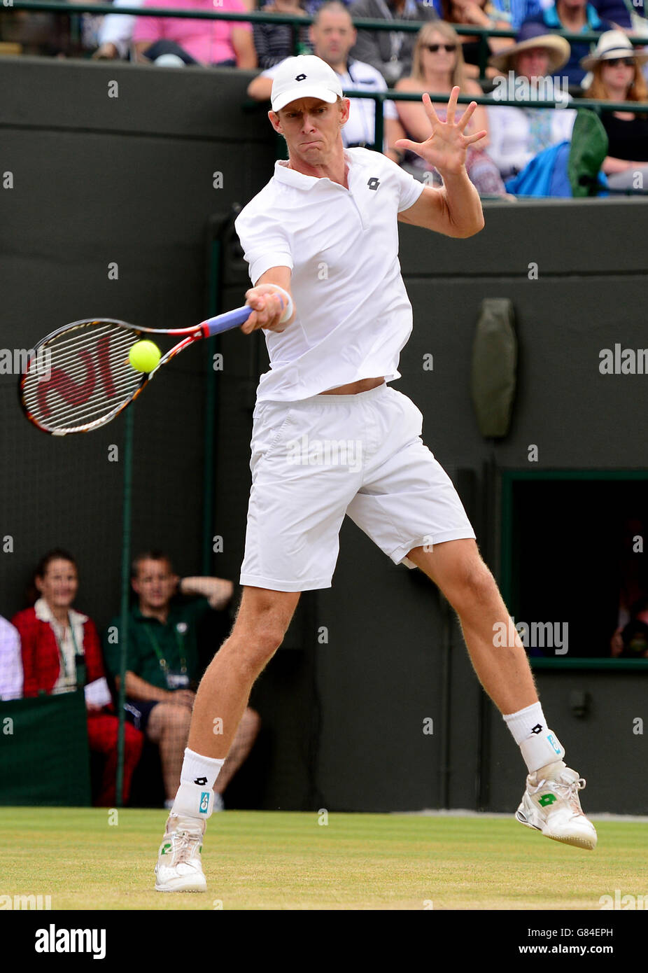 Kevin Anderson in action against Novak Djokovic during day Eight of the Wimbledon Championships at the All England Lawn Tennis and Croquet Club, Wimbledon. Stock Photo