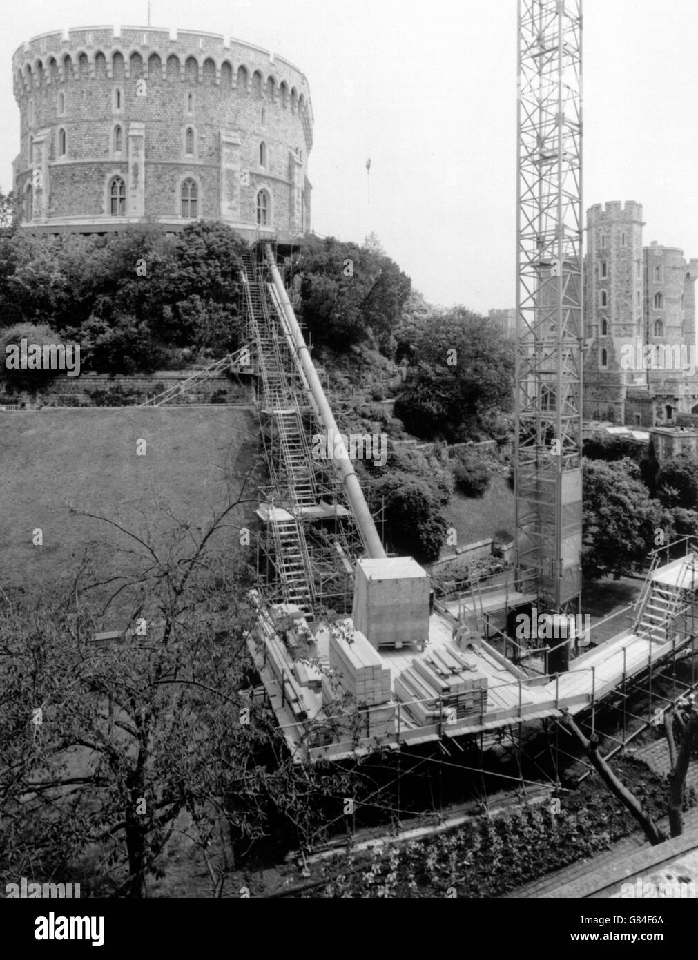 The scaffolding and debris chute built to enable repair work on the Keep of Windsor Castle, which was damaged after heavy rain in January 1988. Stock Photo