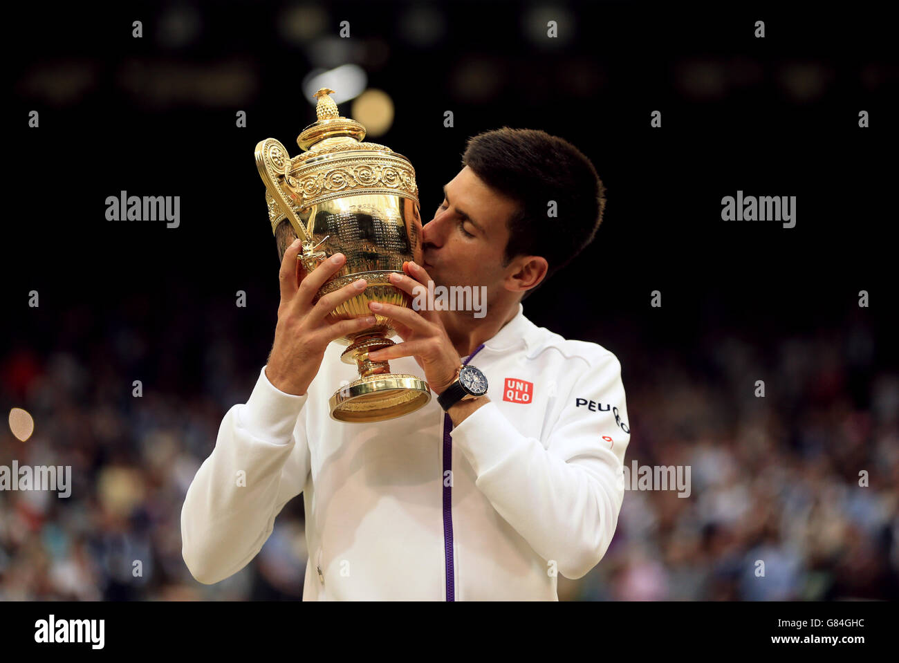 Novak Djokovic Lifts The Wimbledon Trophy As He Celebrates Winning The Men S Single S Final During Day Thirteen Of The Wimbledon Championships At The All England Lawn Tennis And Croquet Club Wimbledon Stock