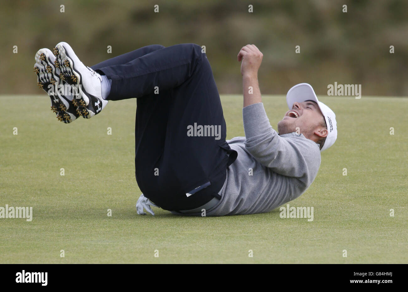 USA's Jordan Spieth reacts to a missed putt on the 5th green during a practice day ahead of The Open Championship 2015 at St Andrews, Fife. Stock Photo
