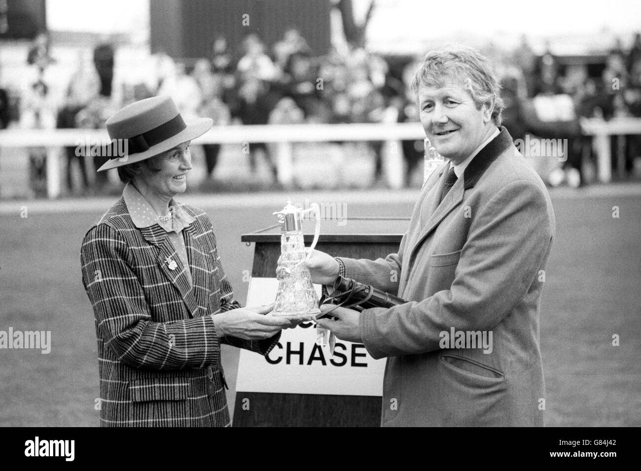 Horse Racing - Desert Orchid Presentation - Midge Burridge and Richard Dunwoody - Kempton Park Racecourse Stock Photo