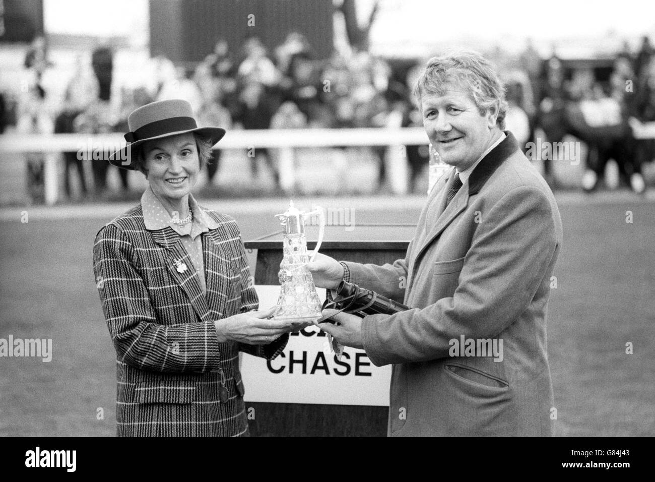 Horse Racing - Desert Orchid Presentation - Midge Burridge and Richard Dunwoody - Kempton Park Racecourse Stock Photo