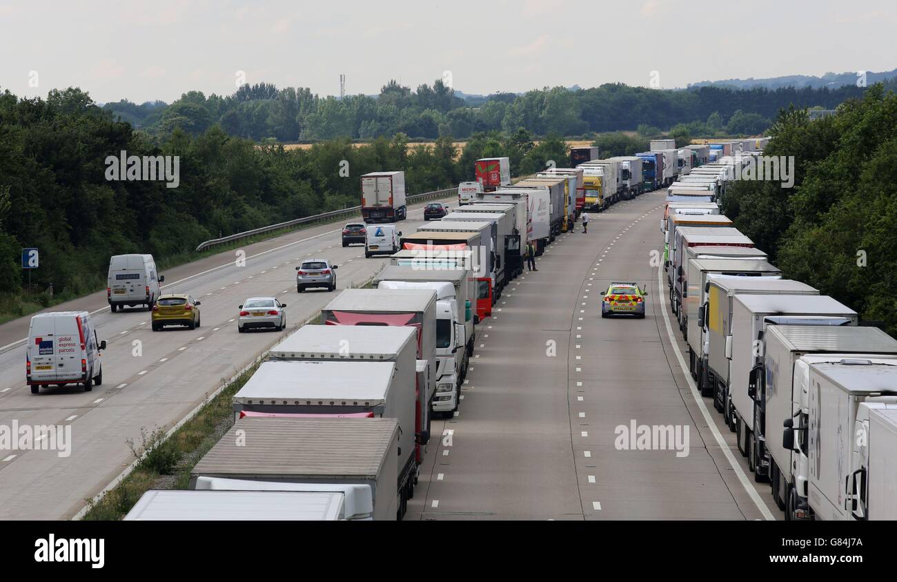 Lorries parked on the M20 in Ashford, Kent, as Operation Stack is enforced due to the weight of freight traffic heading for Europe. Stock Photo