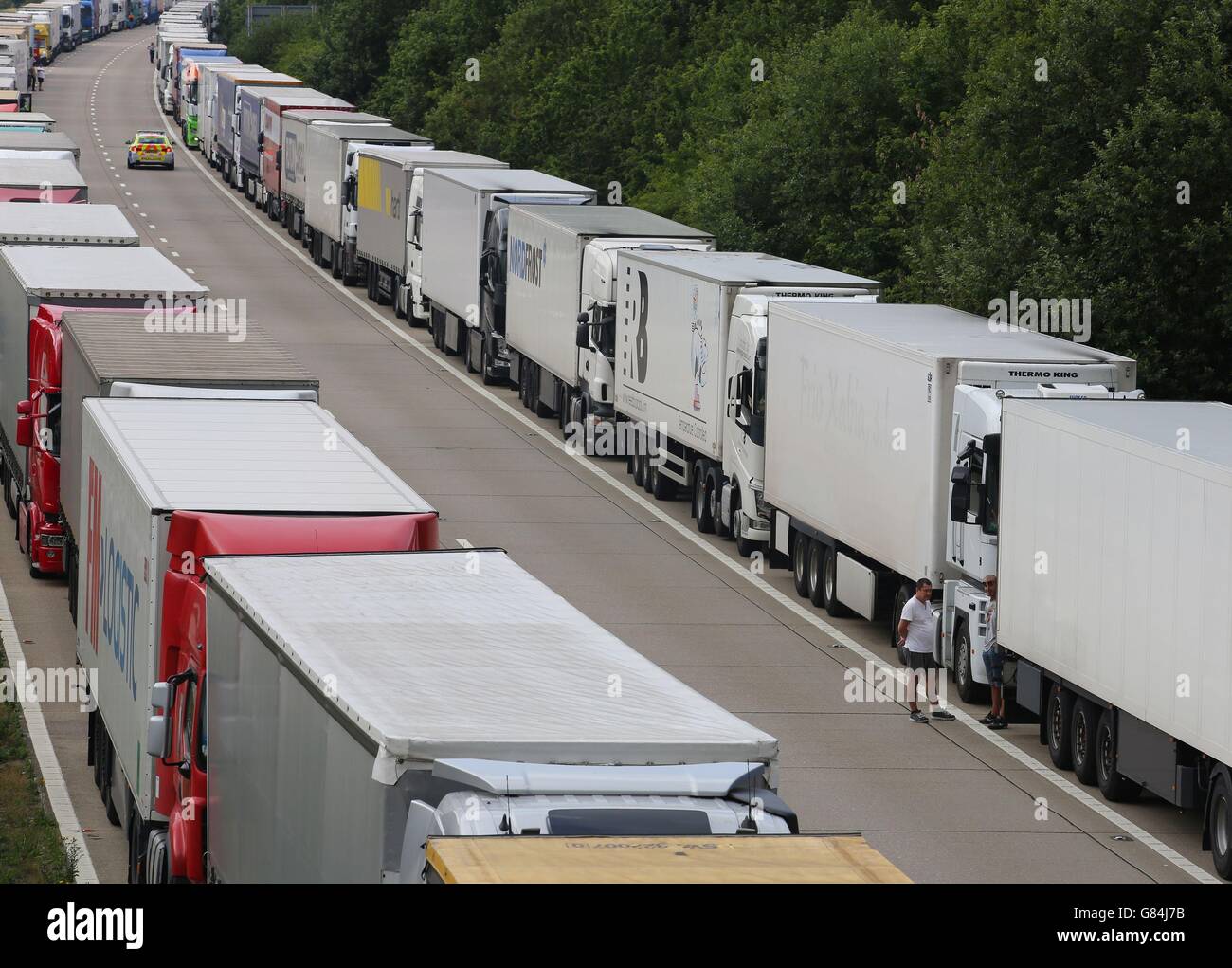 Lorries parked on the M20 in Ashford, Kent, as Operation Stack is enforced due to the weight of freight traffic heading for Europe. Stock Photo