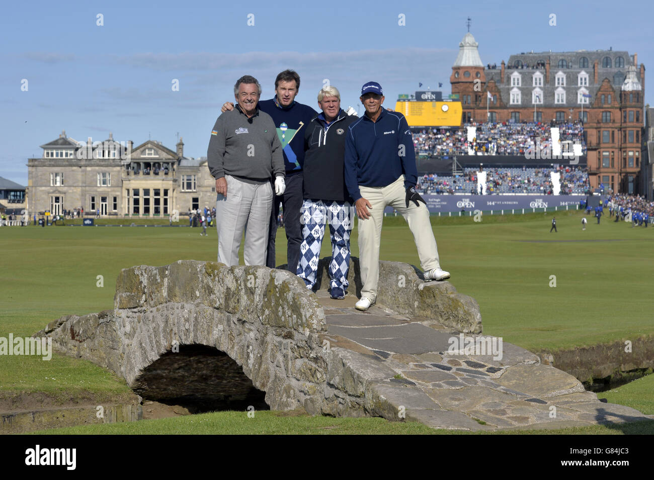 Tony Jacklin, Nick Faldo, John Daly and Tom Lehman pose for a photo on the Swilcan Bridge during the Champions Challenge ahead of The Open Championship 2015 at St Andrews, Fife. Stock Photo